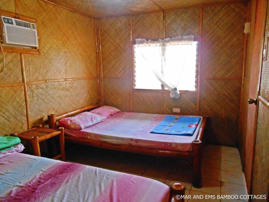Pareja Tourist Inn Логон Номер фото
